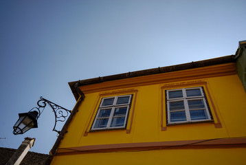 Fototapeta na wymiar buildings and roofs in the city of Sighisoara