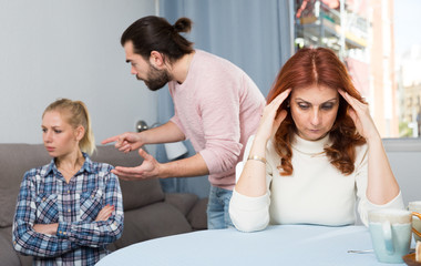 Obraz premium Sad mature woman sitting after conflict with adult children in home