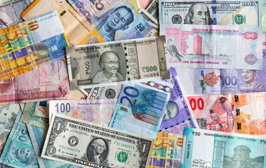 All types of currency note indicating world economy and crisis