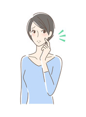 頬をつんつんしてがっかりする女性