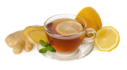 Black tea in glass Cup with saucer and healthy ginger root, mint and lemon isolated on white background