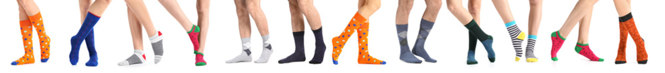 Legs of people in different socks on white background