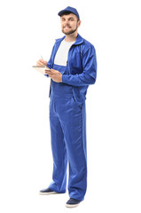 Male truck driver with notebook on white background