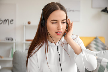 Female technical support agent working at home