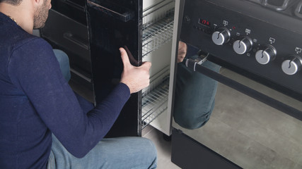 Installation of modern kitchen furniture.