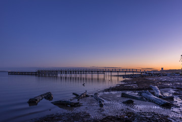Pier Grantville early morning with logs in foreground