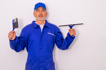 window cleaner or professional cleaning and maintenance worker isolated