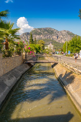 View of the mountains behind the bridge over from the Canal in Gocek, Turkey