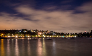 Fototapeta premium clouds moving over the bay at night
