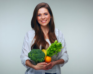 Young woman holding healthy food set