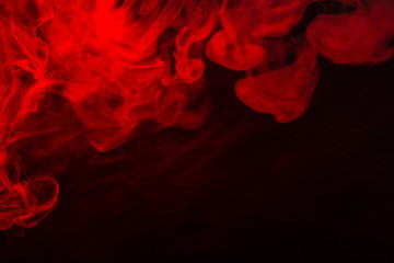 Red steam on a black background.