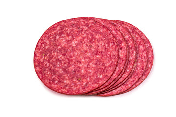 Tasty salami slices isolated on white