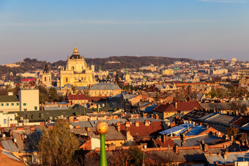 Fototapeta premium Aerial view of St. George's Cathedral and old town of Lviv in Ukraine. Lvov cityscape. View from bell tower of Church of Sts. Olha and Elizabeth