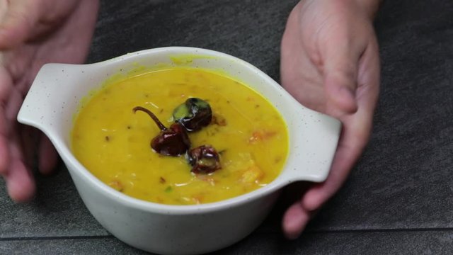 Cooking Pulses or lentils for Daal Tadka, an Indian lentils soup dish.