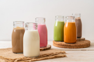  Thai milk tea, matcha green tea latte, coffee, chocolate milk, pink milk and fresh milk in bottle