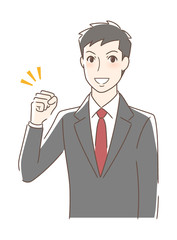 ガッツポーズする男性