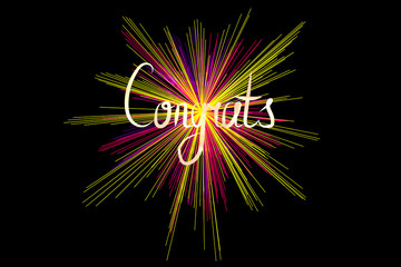 EPS 10 vector. Handwritten congrats with colorful bright firework explosion.