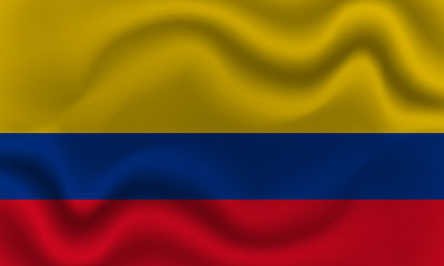 Obraz premium national flag of Colombia on wavy cotton fabric. Realistic vector illustration.