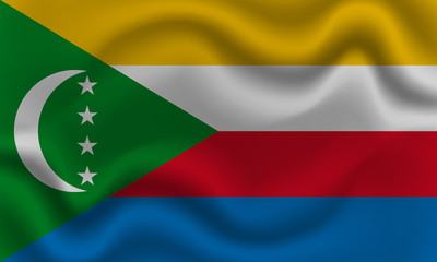 Obraz premium national flag of Comoros on wavy cotton fabric. Realistic vector illustration.