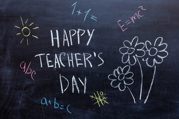 Fototapeta na wymiar Happy Teachers Day written in chalkboard
