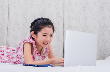 A girl study online at home.