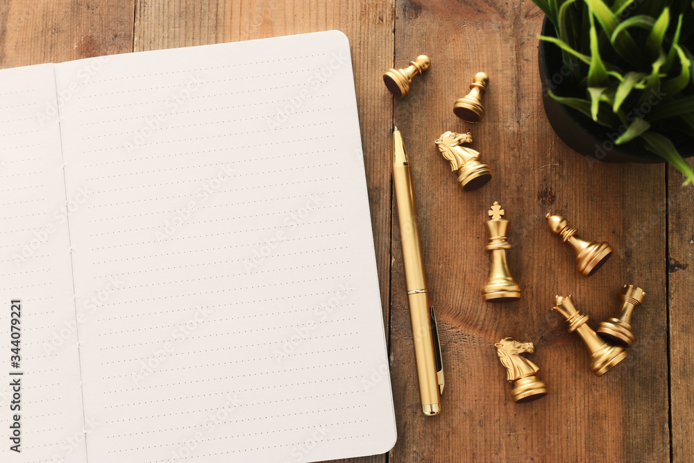 Fototapete top view image of open notebook with blank pages on wooden table. ready for adding text or mockup