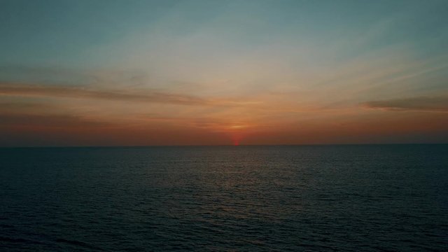 Amazing Sunset Drone Shot Of The Pacific Ocean. Epic Aerial View Of Final Moments Of Sun In Bahia Malaga. Colombia.