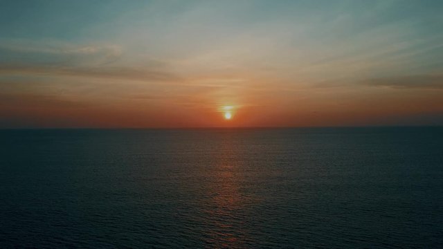 Epic Orange Sunset Drone Shot Of The Pacific Ocean. Beautiful Aerial View Of Pacific Sea In Bahia Malaga. Colombia.