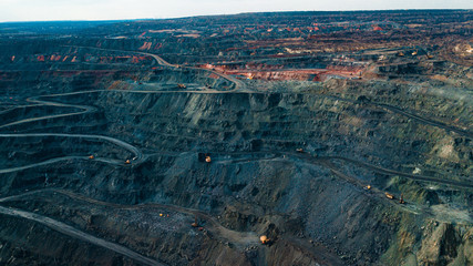 Aerial view of the Iron ore mining, Panorama of an open-cast mine extracting iron ore, preparing...