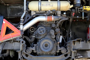 Obraz premium Old bus diesel motor on the disassembly workshop