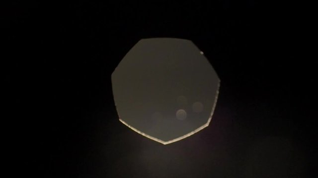 Aperture. Adjusting the amount of light captured by a lens. View from inside of the lens.