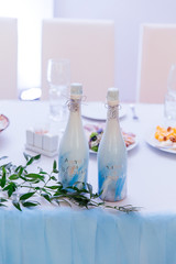 wedding decor and floristry, visiting ceremonies, details, champagne bottles, candles



