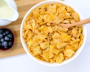 cereal in a white bowl on white background. Healthy breakfast concept.