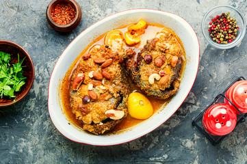 Fried piece of fish.