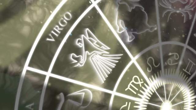 Virgo zodiac sign. 4K animation of the Virgo symbol and star sign appearing on a slowly spinning zodiac wheel. 4K zodiac wheel background.