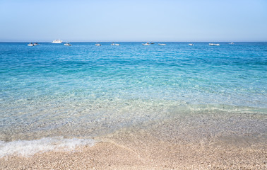 Fototapeta premium Clear azure coloured sea water, Sardinia, Italy
