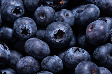 Fresh blueberries textured background, macro