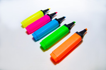 Colorful markers on white background, a lot of colored markers on white background, photo of markers for drawing different colors. 
