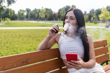 Attractive woman relaxing at the park