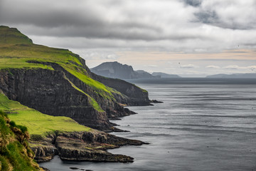 Steep coastline of Mykines island, Faroe Islands