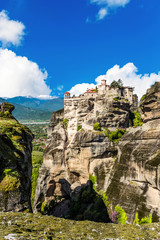 Fototapeta na wymiar Mysterious hanging over rocks monasteries of Meteora, Greece