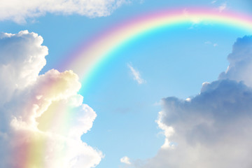 Picturesque view of beautiful rainbow and blue sky on sunny day - Powered by Adobe