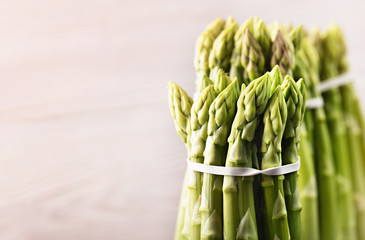 Bunch green asparagus, organic food. Space for text