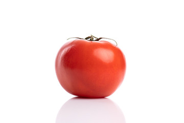 Fresh organic red tomato isolated on white background