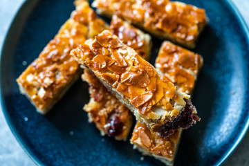 Homemade Scandinavian Dessert Swedish Tosca Cake with Almond Slices / Toscakaka. Top View.