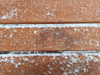 wooden planks in the snow, suitable for background