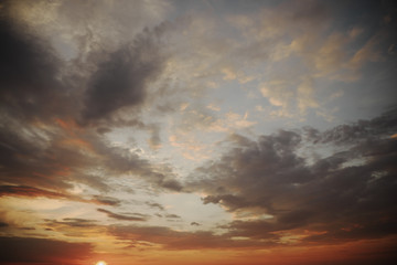 Fototapeta na wymiar Dramatic sunset sky. Cloudy sky as a background.