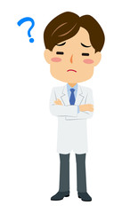 Fototapeta premium 白衣の男性 腕組み 悩む