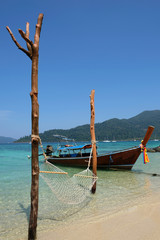 Hanging hammock over the turquoise sea of Thailand