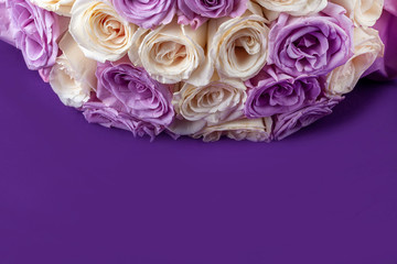 Bouquet of fresh amazing white and purple roses for postcard, cover, banner. Beautiful flowers as gift for Mother’s, Valentine’s Day, Birthday or Wedding. Copy space for text, soft focus